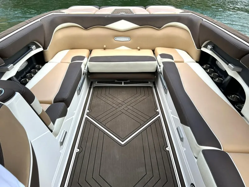 Slide: The Image of 2017 Supra SE 550 boat interior with luxurious seating and elegant design. - 4