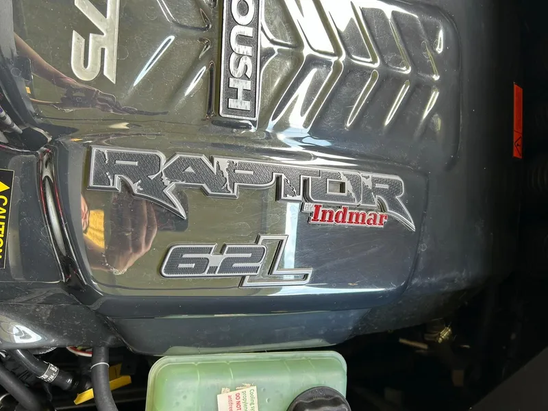 Slide: The Image of 2017 Supra SE 550 engine featuring Raptor Indmar 6.2L branding. - 44