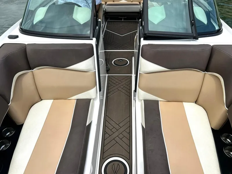 Slide: The Image of 2017 Supra SE 550 boat interior with beige and brown seating, stylish design. - 47