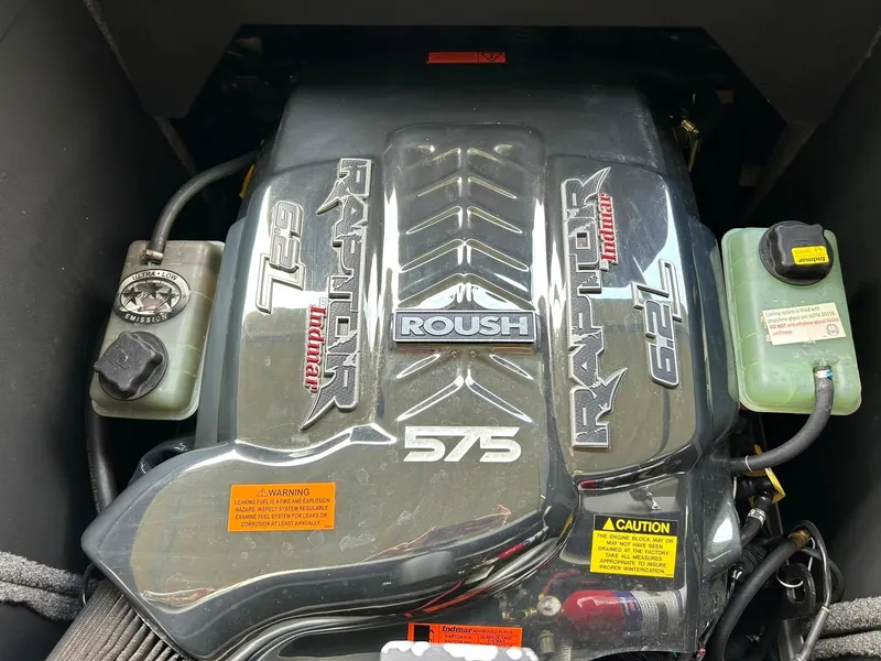 Slide: The Image of 2017 Supra SE 550 engine with Roush Raptor 575 branding and fluid reservoirs visible. - 6