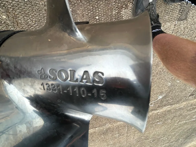 Slide: The Image of Close-up of a Solas propeller on a 2022 Lowe Skorpion 17 boat. - 23
