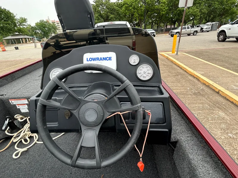 Slide: The Image of Steering console of 2022 Lowe Skorpion 17 boat with Lowrance electronics. - 27