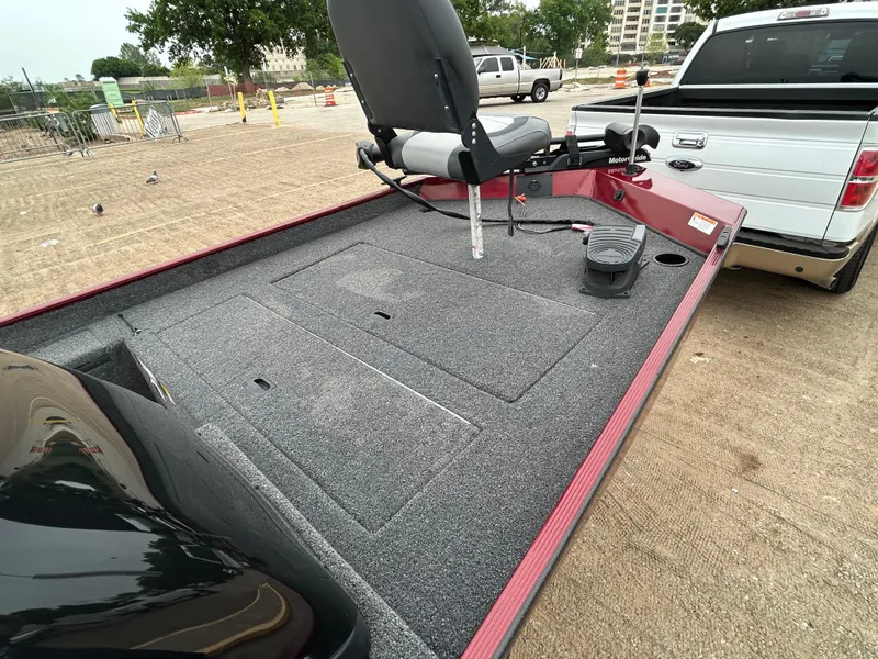 Slide: The Image of 2022 Lowe Skorpion 17 boat deck attached to a white pickup truck. - 28