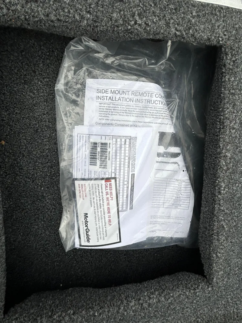 Slide: The Image of Installation instructions for Lowe Skorpion 17, 2022 model, in a plastic bag on a textured surface. - 38