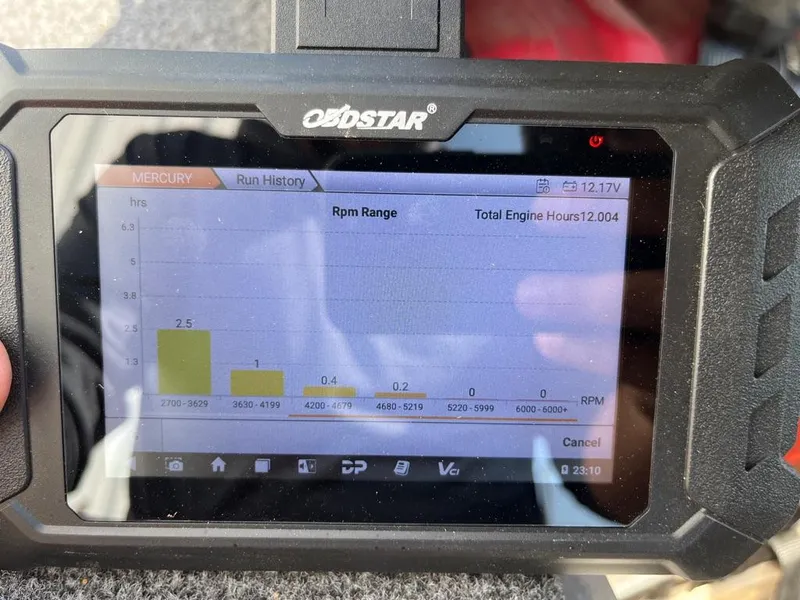 Slide: The Image of 2022 Lowe Skorpion 17 fishing boat on trailer, parked near a lake. - 4