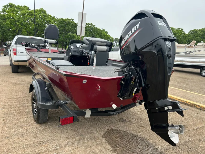 Slide: The Image of 2022 Lowe Skorpion 17 boat with Mercury 60 engine, parked on a trailer. - 7