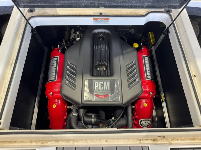 Slide: The Image of 2019 Nautique Super Air Nautique GS22 engine compartment with PCM marine engine. - 26