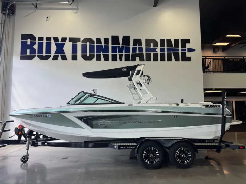 Slide: The Image of 2019 Nautique Super Air Nautique GS22 boat displayed at Buxton Marine showroom. - 4
