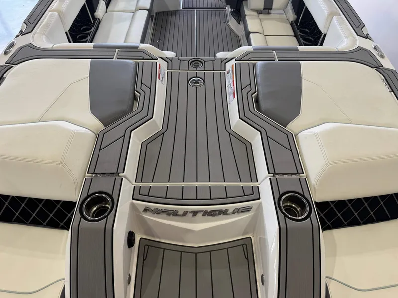 Slide: The Image of 2019 Nautique Super Air Nautique GS22 interior with sleek seating and modern design. - 8