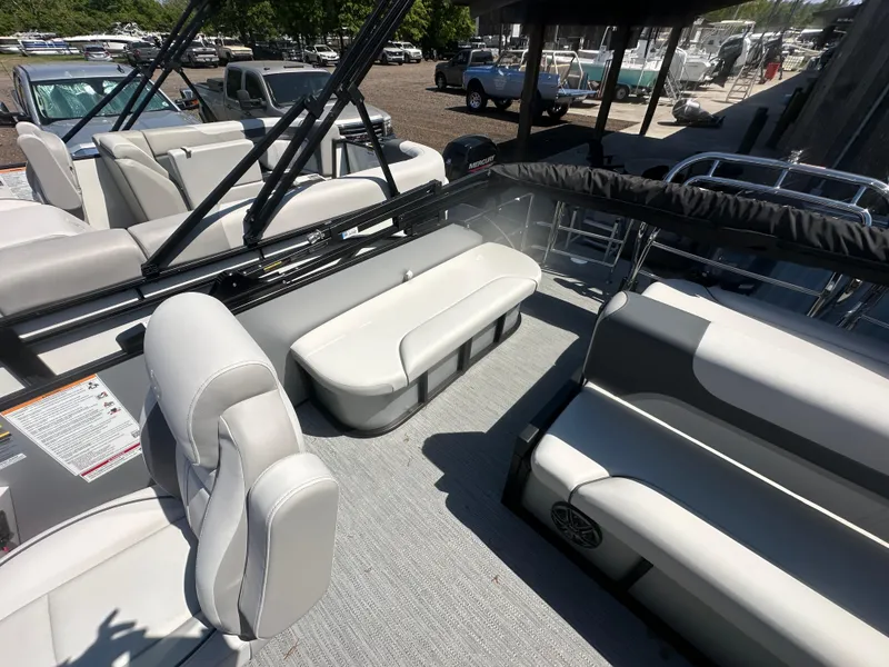 Slide: The Image of 2025 Godfrey Sweetwater 2286 SFLC pontoon boat interior with gray seating and modern design. - 9