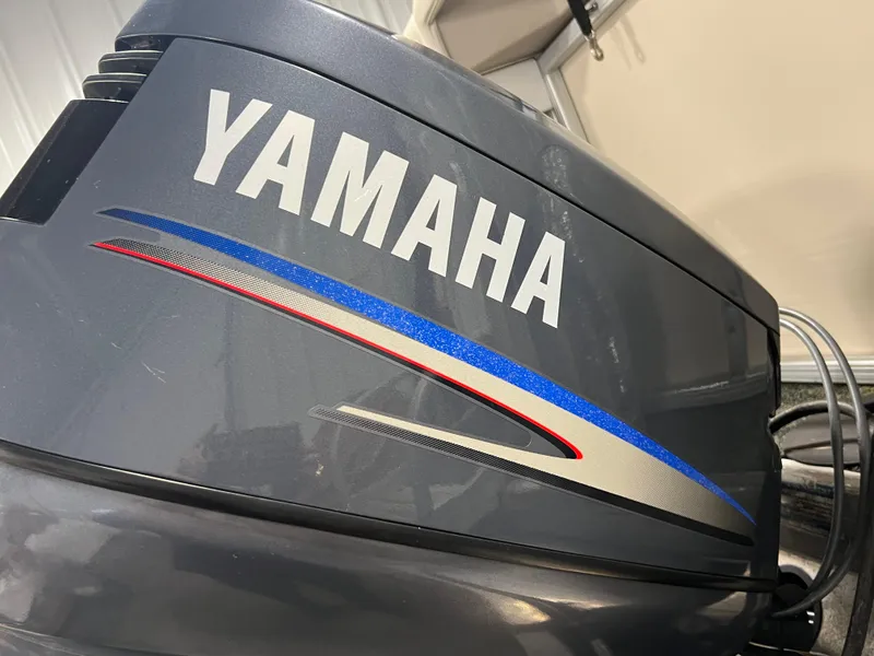 Slide: The Image of Yamaha outboard motor on 2008 Sweetwater 2386 RE boat, close-up view. - 20