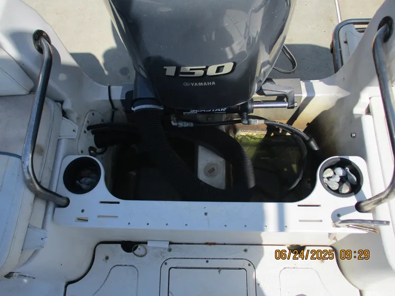 Slide: The Image of 2007 Triumph 21 Center Console boat with Yamaha 150 engine, viewed from above. - 14