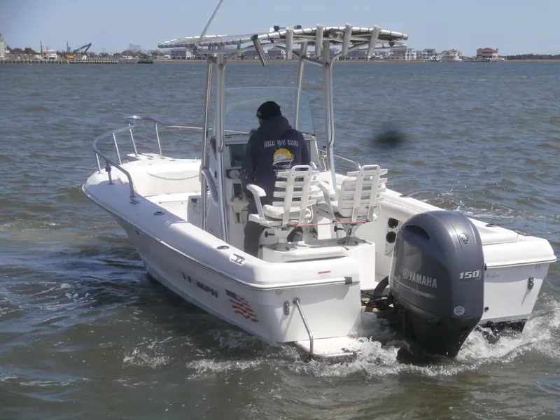 Slide: The Image of 2007 Triumph 21 Center Console boat with Yamaha 150 engine on open water. - 3