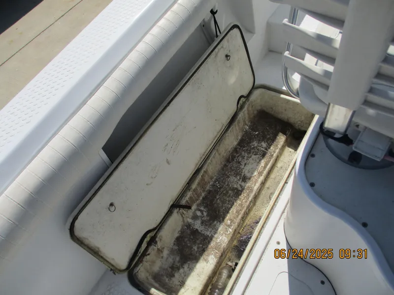 Slide: The Image of 2007 Triumph 21 Center Console boat storage compartment, open and empty. - 30