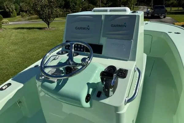 Slide: The Image of Custom Vernese V23 boat dashboard with Garmin navigation, 2021 model, mint green finish. - 22