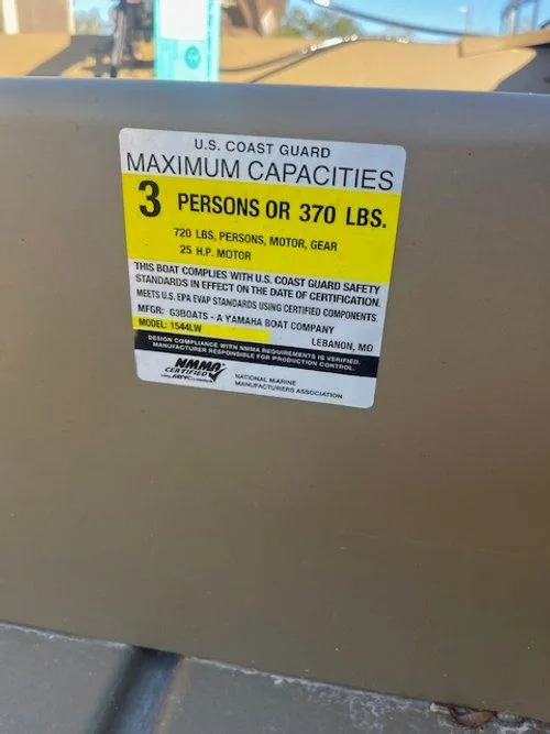 Slide: The Image of U.S. Coast Guard capacity label on 2025 G3 Gator Tough 1544 LW boat. - 6