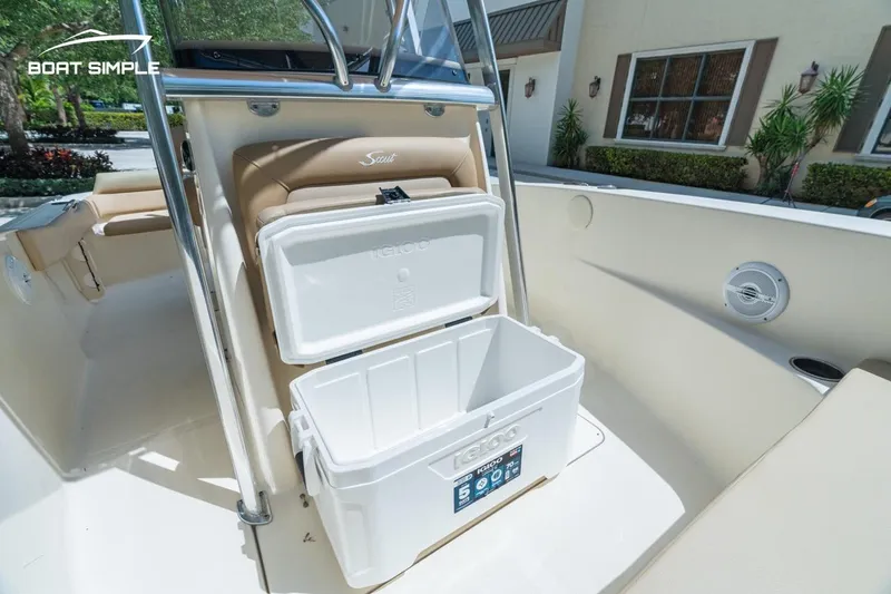 Slide: The Image of 2022 Scout 195 Sportfish boat with open cooler on deck. - 16