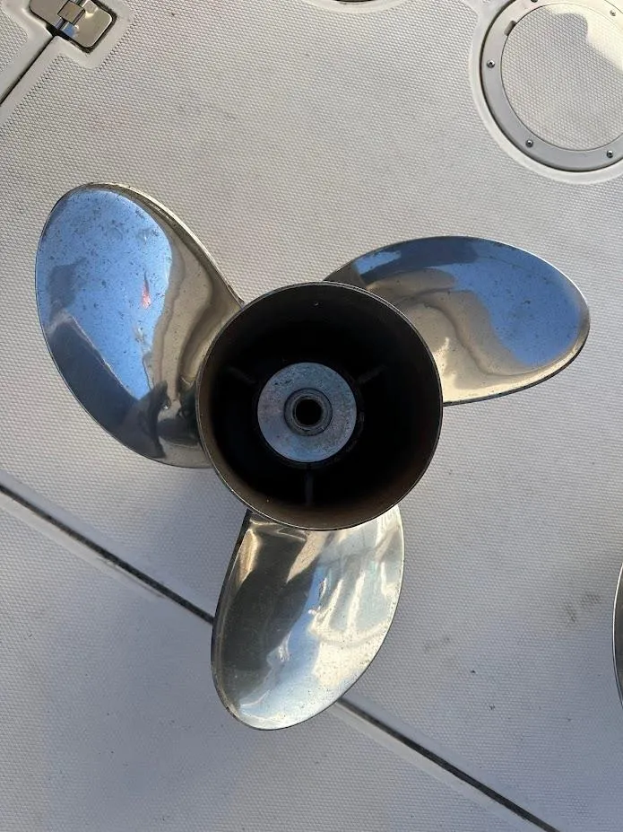 Slide: The Image of Stainless steel boat propeller on a 2022 Grady-White Express 330. - 10