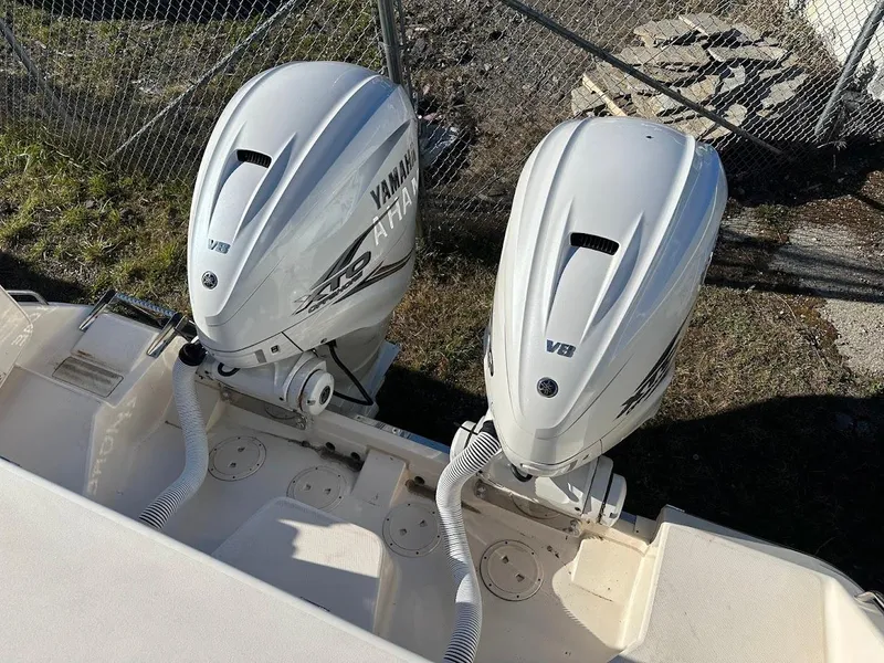 Slide: The Image of Twin Yamaha V8 outboard engines on a 2022 Grady-White Express 330 boat. - 14
