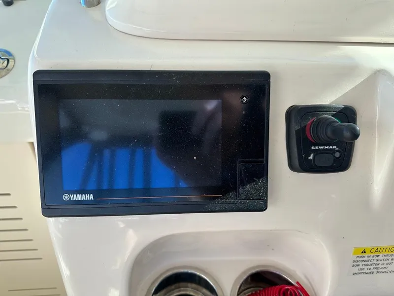 Slide: The Image of Control panel of 2022 Grady-White Express 330 boat with Yamaha display. - 24