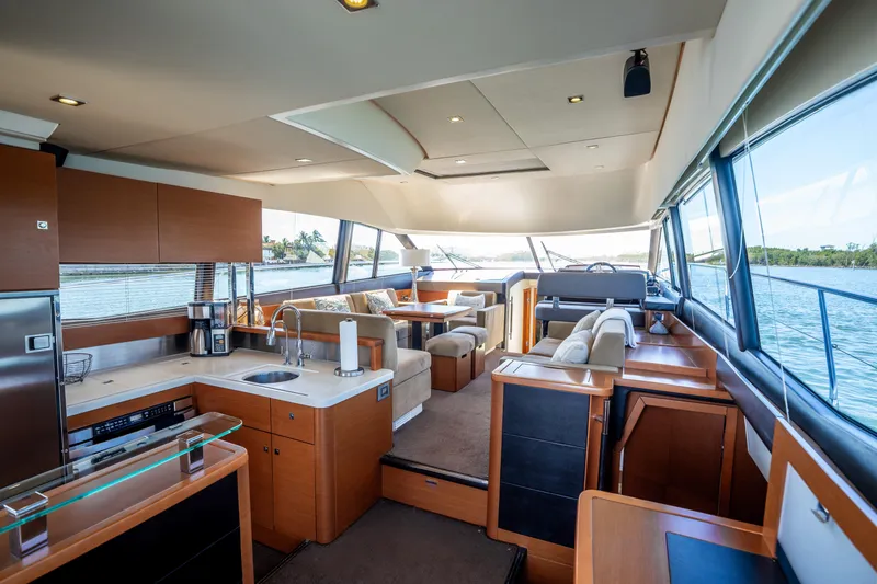 Slide: The Image of Luxurious interior of a 2012 Prestige 500 Fly yacht with modern amenities and scenic views. - 28