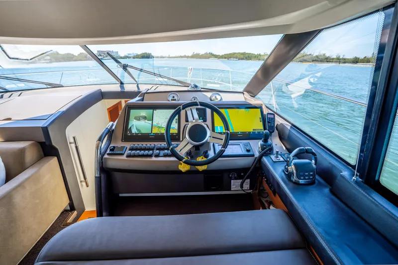 Slide: The Image of Cockpit of 2012 Prestige 500 Fly yacht with modern navigation equipment. - 40