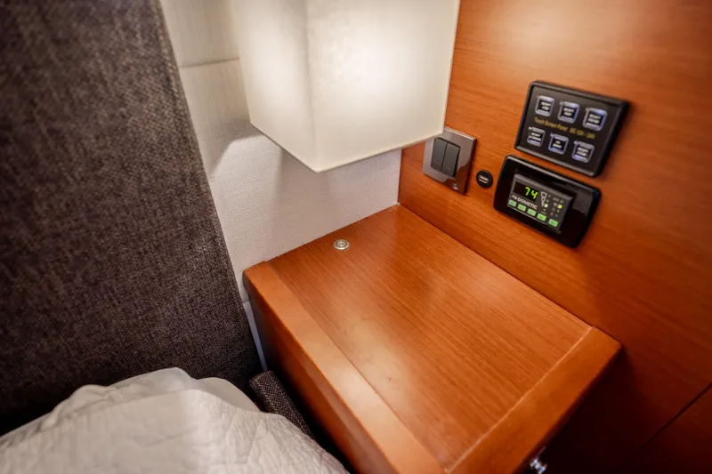 Slide: The Image of Luxurious cabin interior of 2012 Prestige 500 Fly yacht with modern controls and lighting. - 45