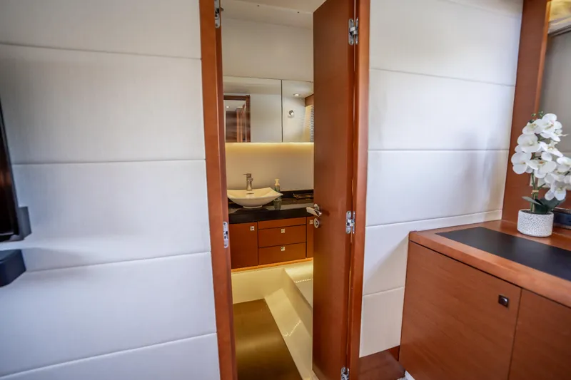 Slide: The Image of Luxurious bathroom interior on a 2012 Prestige 500 Fly yacht, featuring modern fixtures and elegant design. - 46