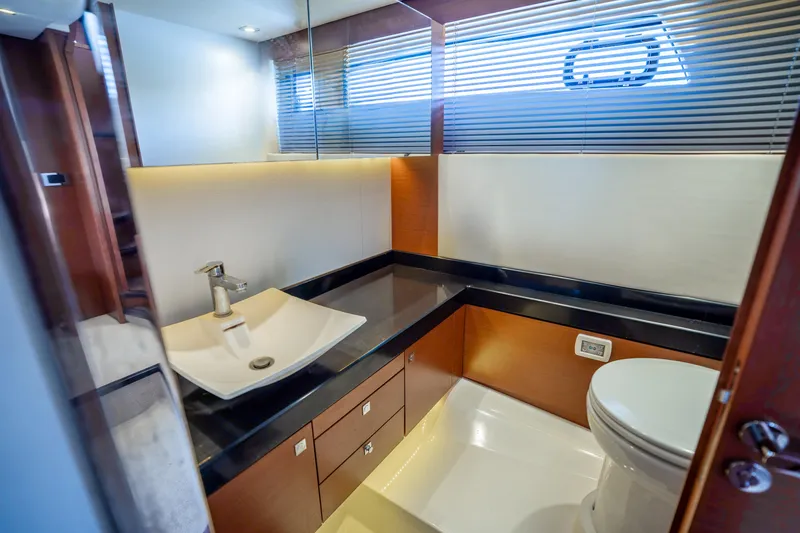 Slide: The Image of Luxurious bathroom in 2012 Prestige 500 Fly yacht with modern fixtures and elegant design. - 47