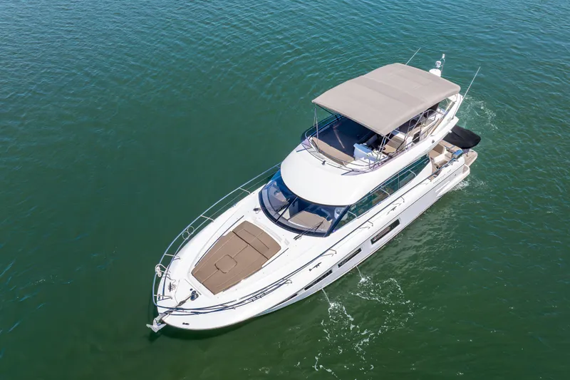 Slide: The Image of Prestige 500 Fly 2012 yacht cruising on calm waters, aerial view. - 7
