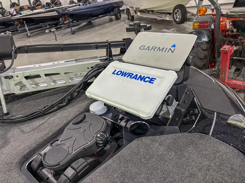 Slide: The Image of 2025 Skeeter FXR 20 boat with Garmin and Lowrance navigation systems. - 8