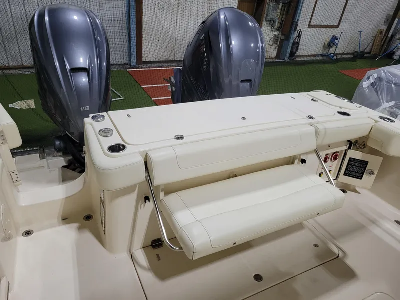 Slide: The Image of 2019 Grady-White Canyon 336 boat with dual V8 engines and foldable seating. - 10
