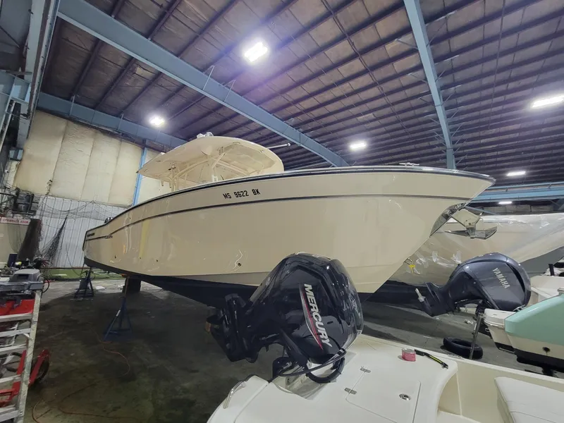 Slide: The Image of 2019 Grady-White Canyon 336 boat in indoor storage with Mercury outboard engines. - 3