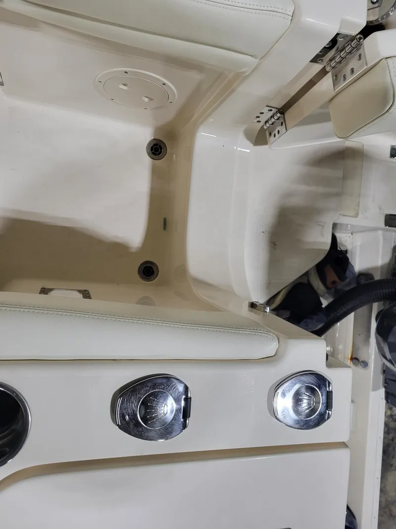 Slide: The Image of 2019 Grady-White Canyon 336 boat interior with seating and cup holders. - 41