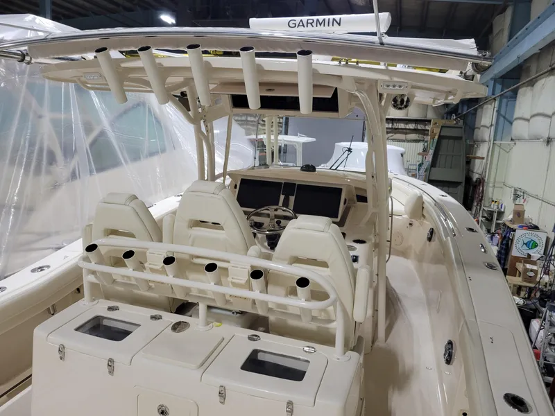 Slide: The Image of 2019 Grady-White Canyon 336 boat interior with Garmin equipment in a storage facility. - 7
