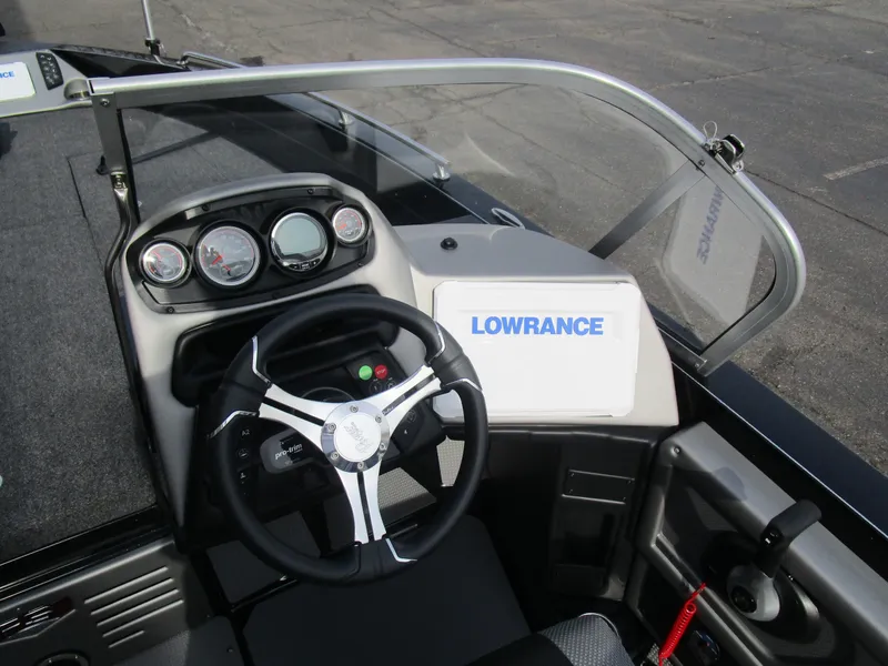 Slide: The Image of 2024 Ranger 621 CUP boat dashboard with steering wheel and Lowrance navigation system. - 4