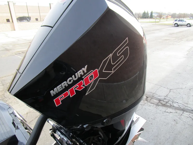 Slide: The Image of Mercury Pro XS engine on 2024 Ranger 621 CUP boat, parked outdoors. - 9