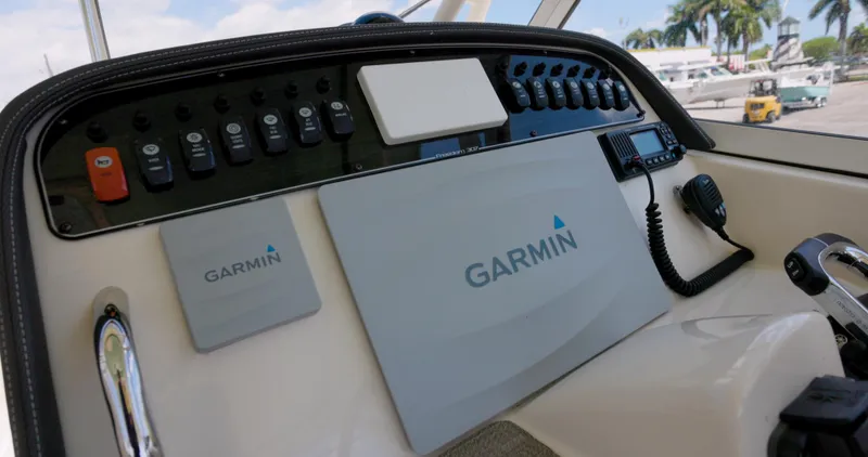 Slide: The Image of Control panel of 2018 Grady-White Freedom 307 boat with Garmin navigation system. - 9