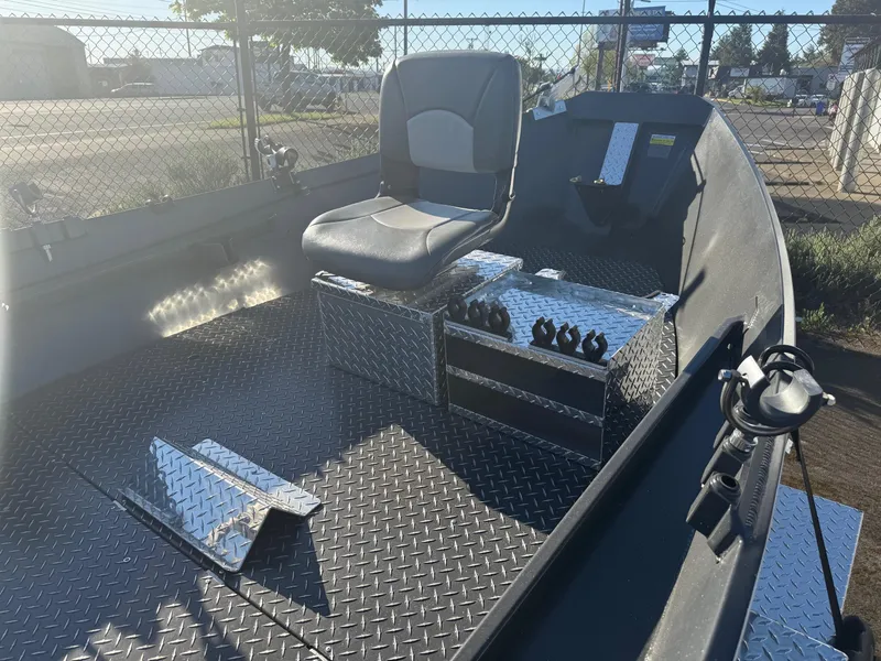 Slide: The Image of Interior of 2025 Driftwood Boats Drifter 18.5 with metal flooring and seating. - 10