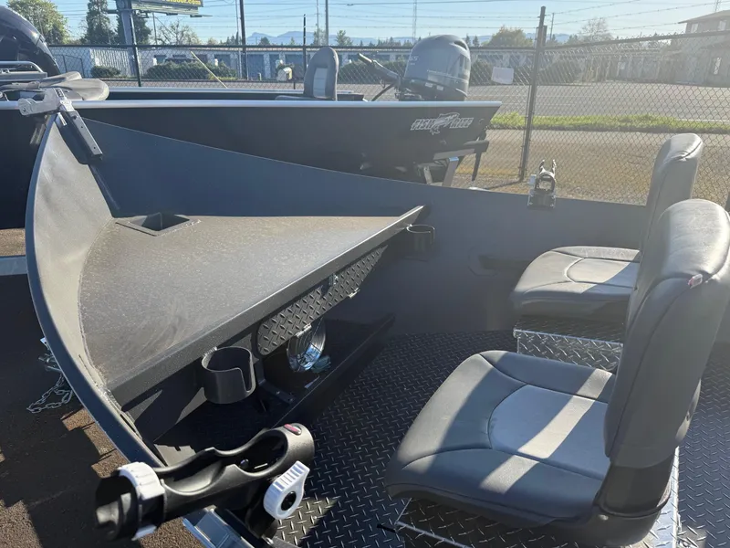 Slide: The Image of 2025 Driftwood Boats Drifter 18.5 interior with seating and fishing rod holder. - 13