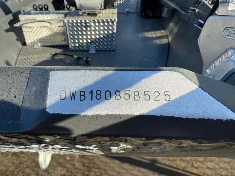 Slide: The Image of Hull identification number on 2025 Driftwood Boats Drifter 18.5, showing "DWB18085B525". - 16