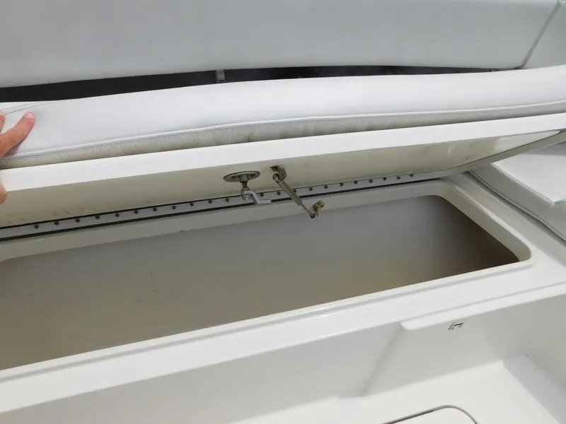 Slide: The Image of Open storage compartment on a 2013 Hydra-Sports 4200 Siesta boat. - 16