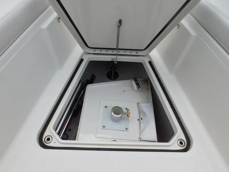 Slide: The Image of 2013 Hydra-Sports 4200 Siesta storage compartment with open hatch, showcasing interior details. - 17