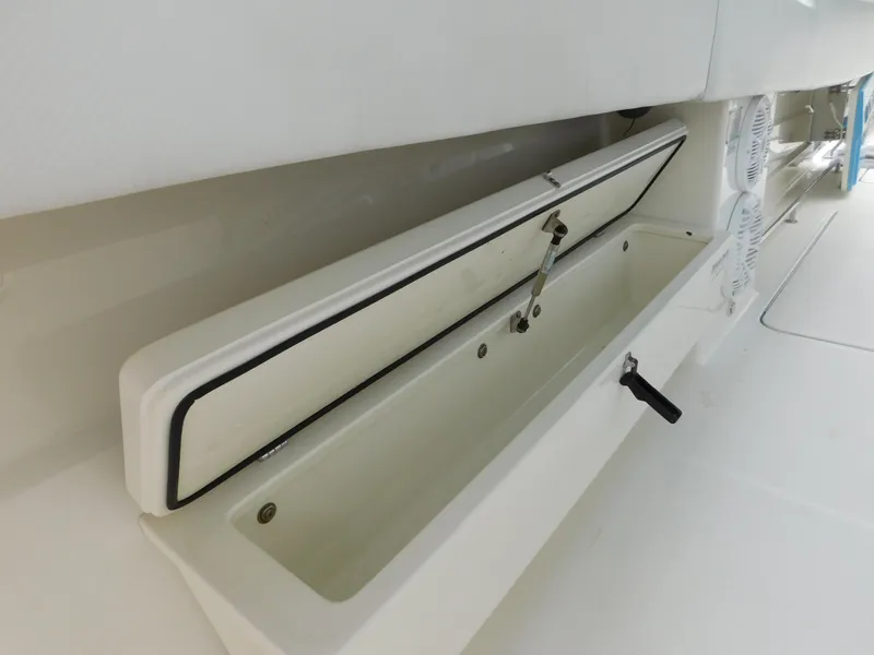 Slide: The Image of Open storage compartment on 2013 Hydra-Sports 4200 Siesta boat interior. - 29