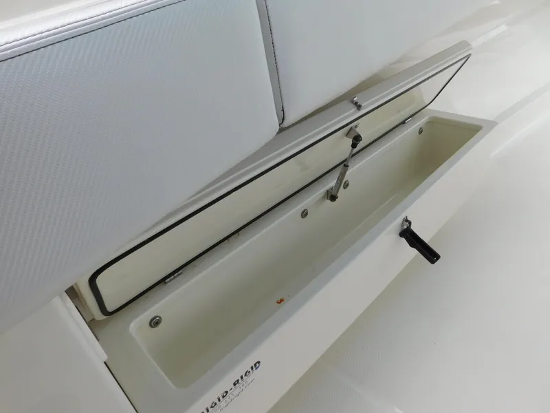 Slide: The Image of Open storage compartment on 2013 Hydra-Sports 4200 Siesta boat. - 30