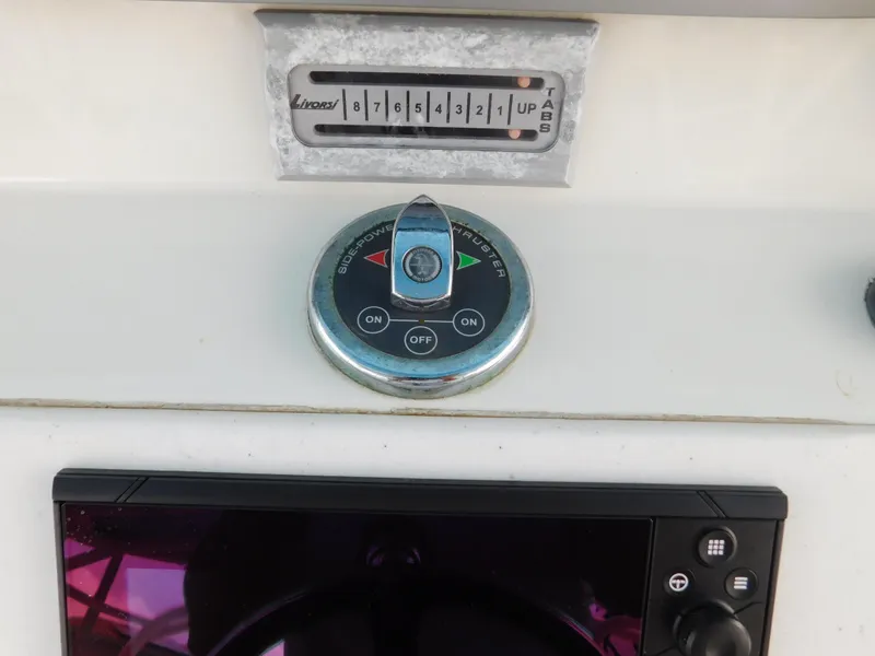 Slide: The Image of Control panel of a 2013 Hydra-Sports 4200 Siesta boat with switches and dials. - 41