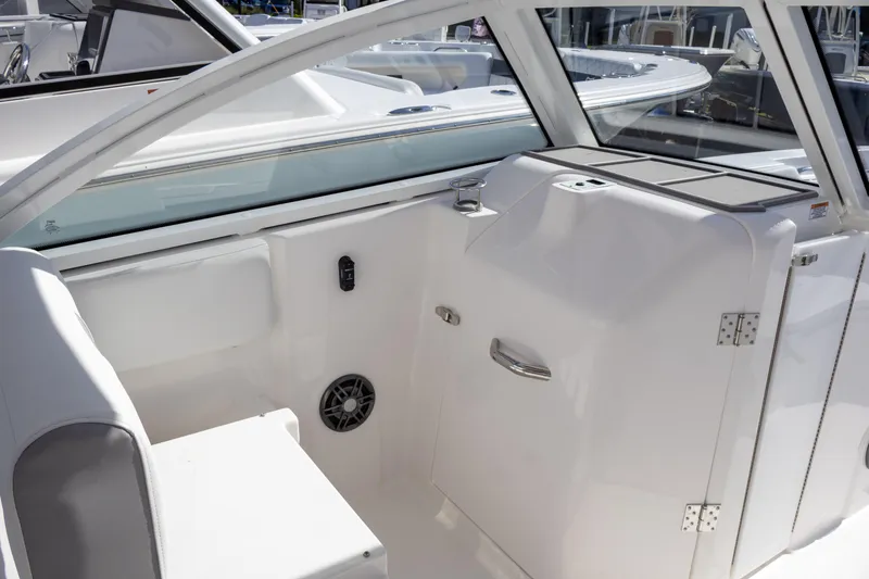 Slide: The Image of 2025 Sea Fox 268 Traveler boat interior with seating and storage compartments. - 10