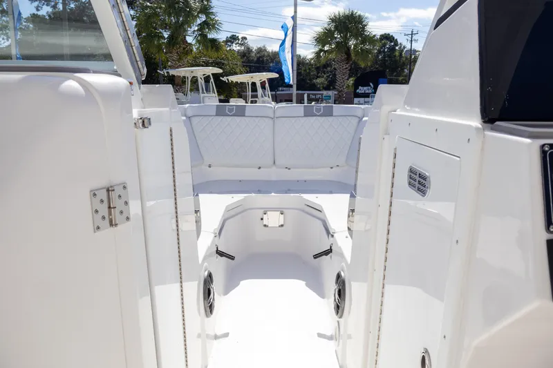 Slide: The Image of 2025 Sea Fox 268 Traveler boat interior, showcasing spacious deck and modern design. - 12