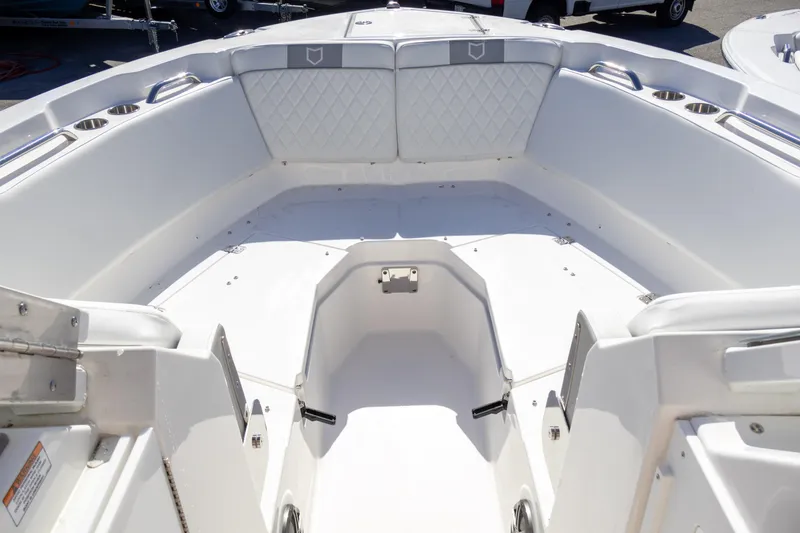 Slide: The Image of 2025 Sea Fox 268 Traveler boat interior with white seating and stainless steel accents. - 13