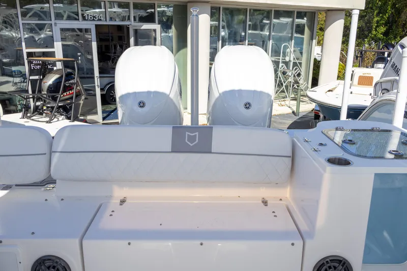 Slide: The Image of 2025 Sea Fox 268 Traveler boat with dual engines, rear seating, and modern design. - 19